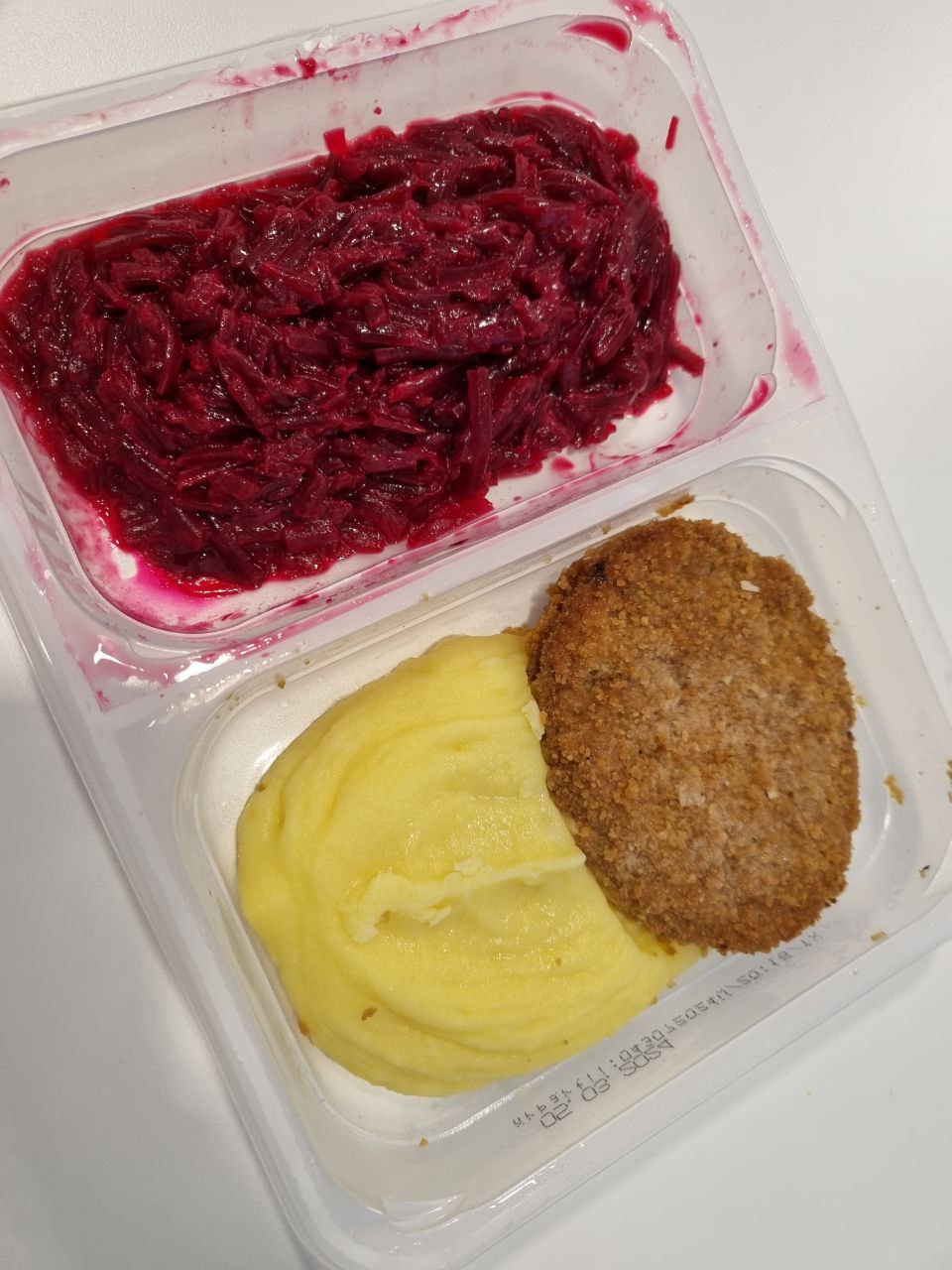 Beetroot Salad, Mashed Potatoes, and Breaded Cutlet Meal