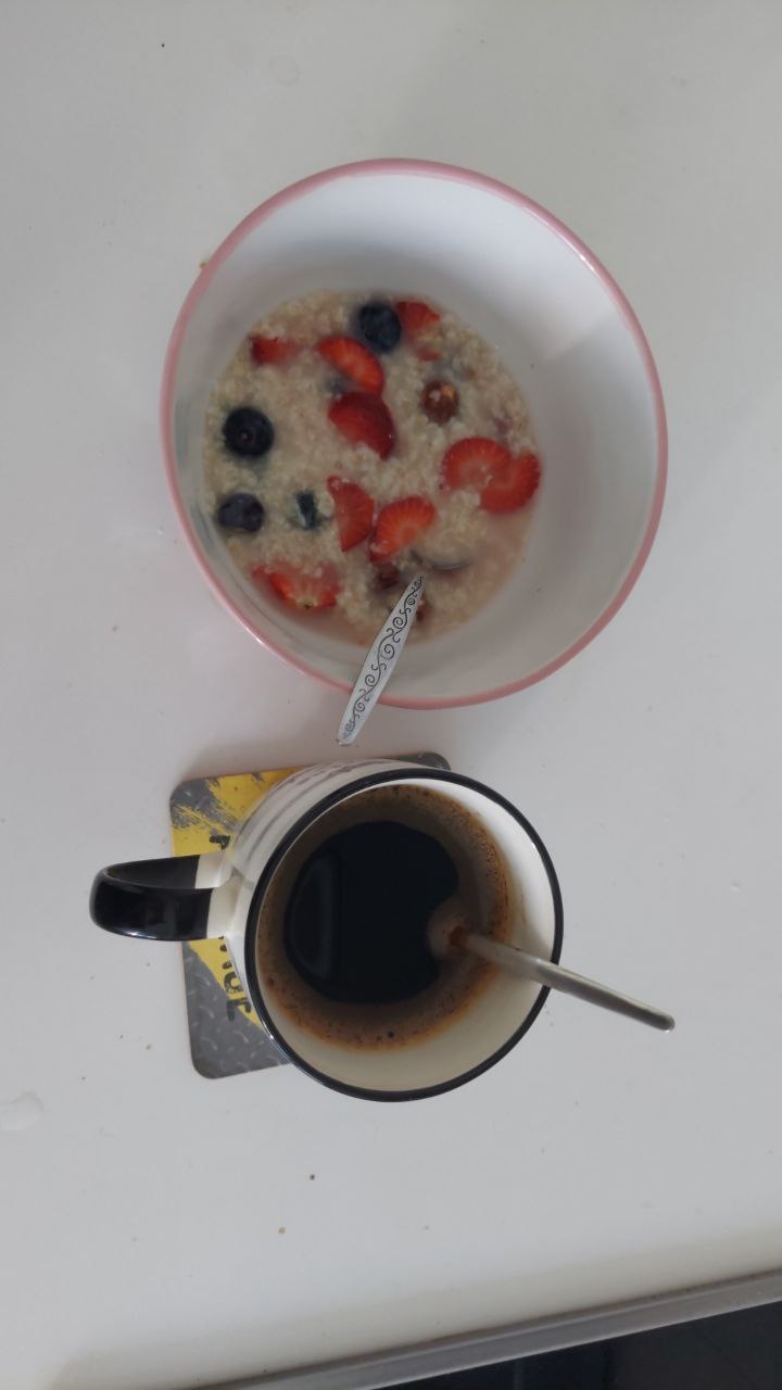 Oatmeal With Fresh Fruit And Black Coffee