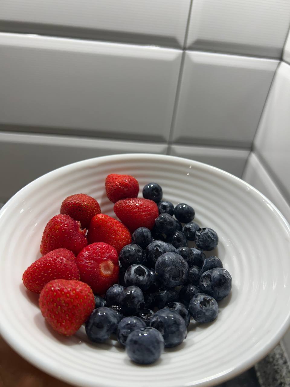 Bowl Of Strawberries And Blueberries