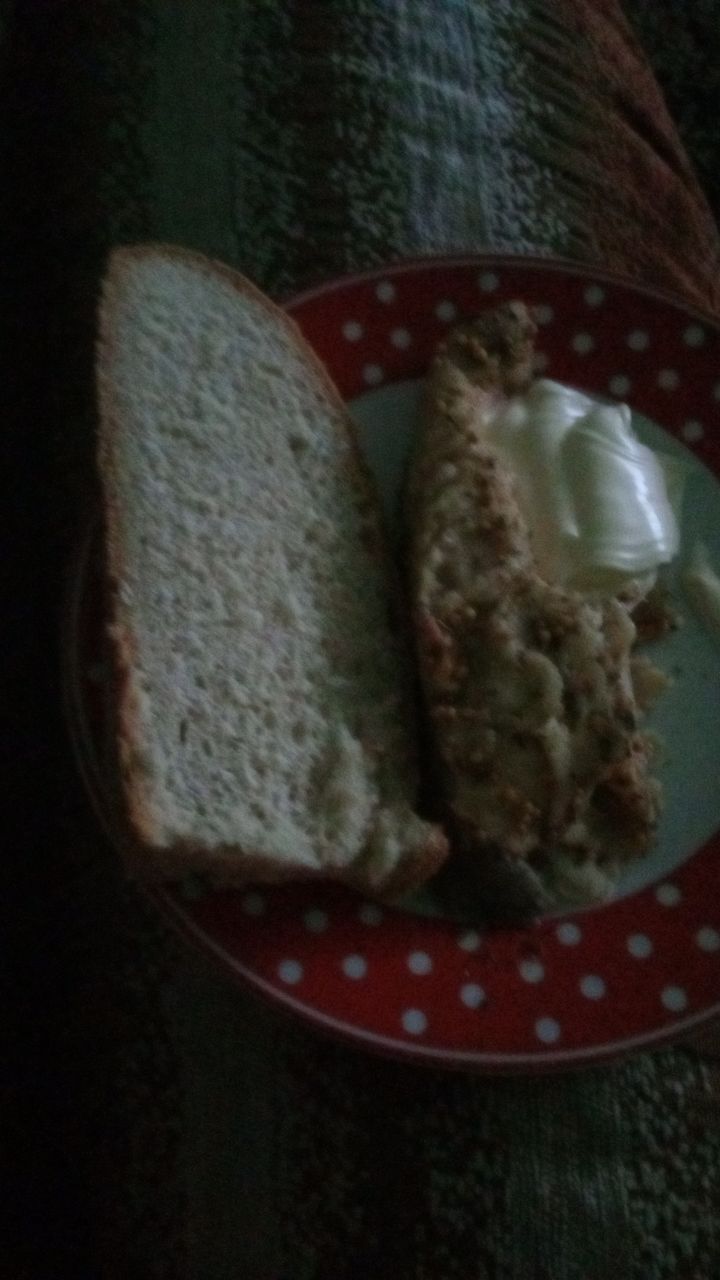 Slice Of Meatloaf With A Dollop Of Creamy Condiment