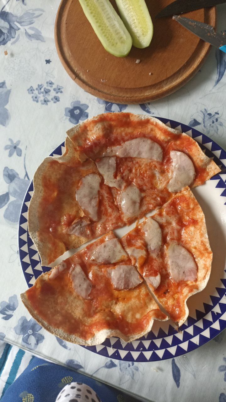 Homemade Pizza With Thin Crust And Sausage