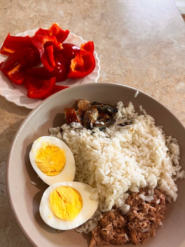 Homemade Rice Bowl With Boiled Egg, Tuna, And Red Bell Pepper