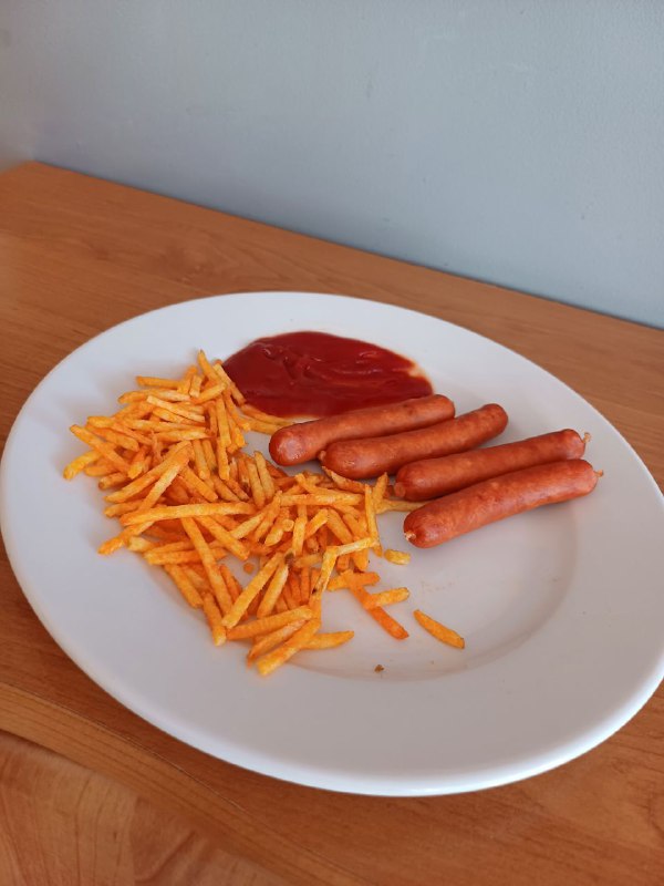 Sausages With French Fries And Ketchup