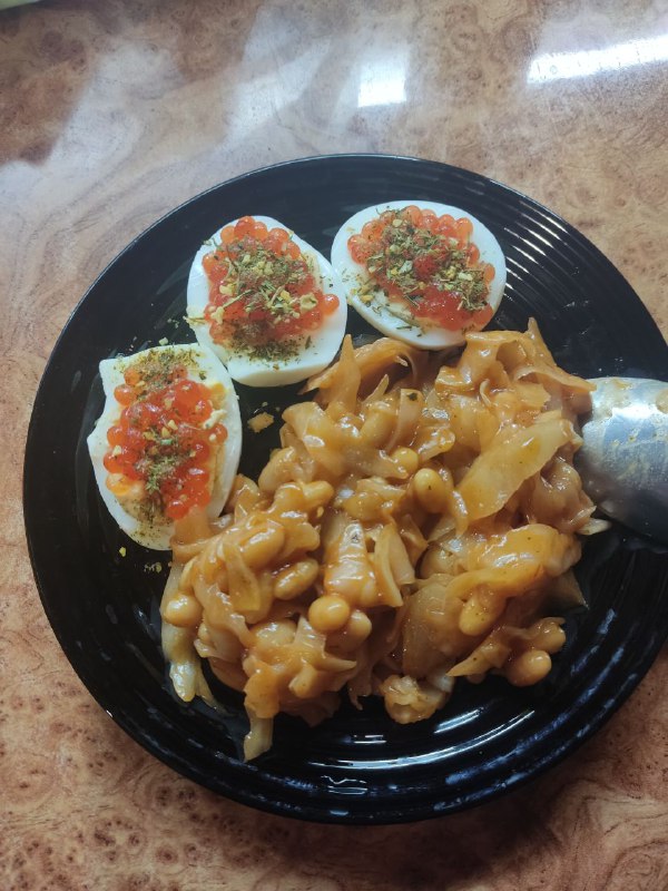 Pasta With Sauce And Halved Boiled Eggs