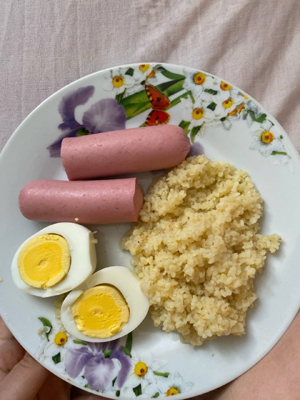 Boiled Eggs, Cooked Sausages, And Brown Rice