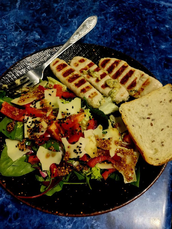 Grilled Chicken Salad With A Side Of Bread