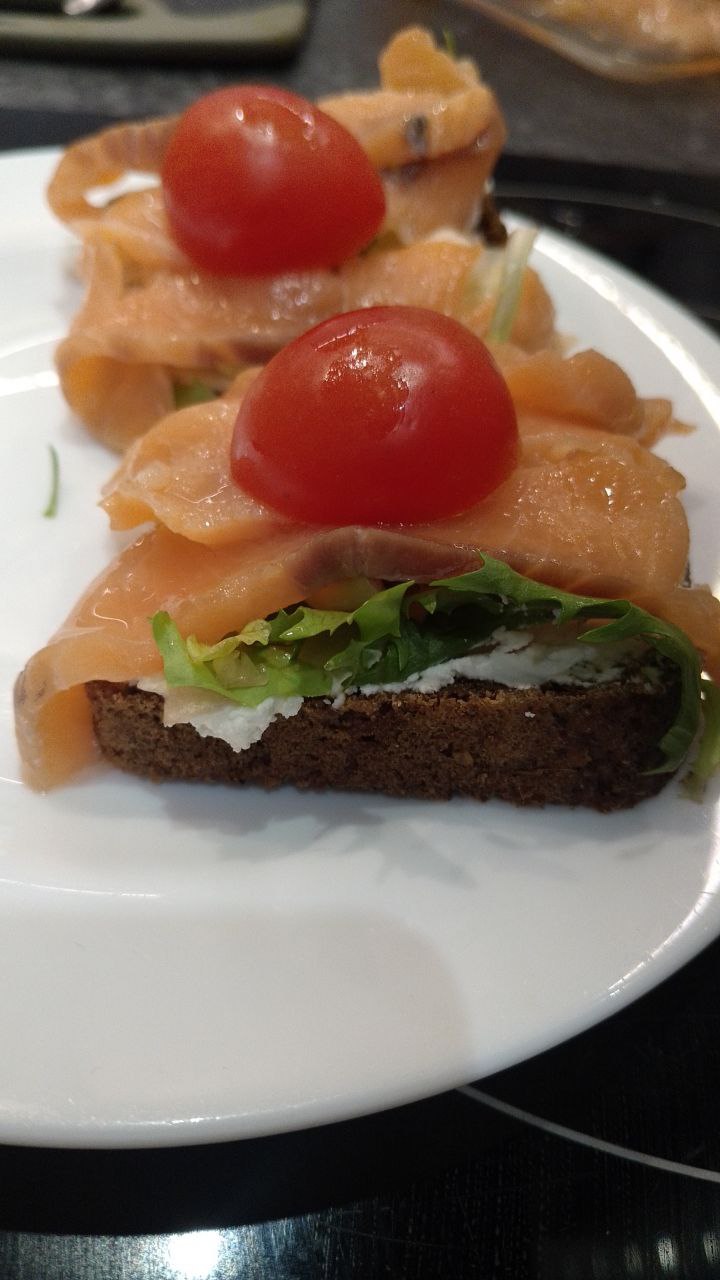 Smoked Salmon On Toast With Cream Cheese And Cherry Tomatoes