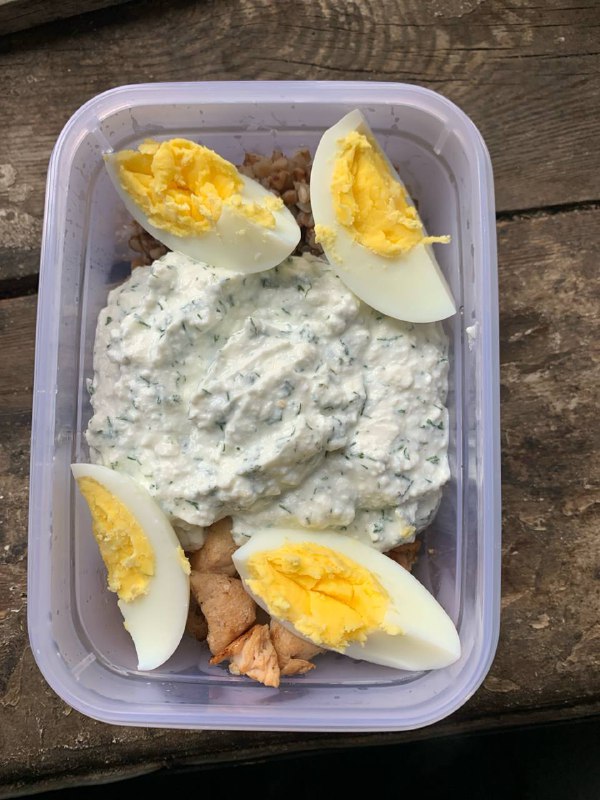Homemade Meal With Hard-boiled Eggs And Creamy Herb Sauce