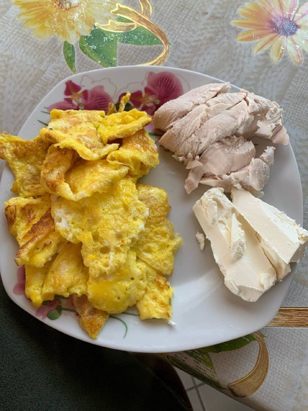 Scrambled Eggs With Chicken Breast And A Slice Of Cheese