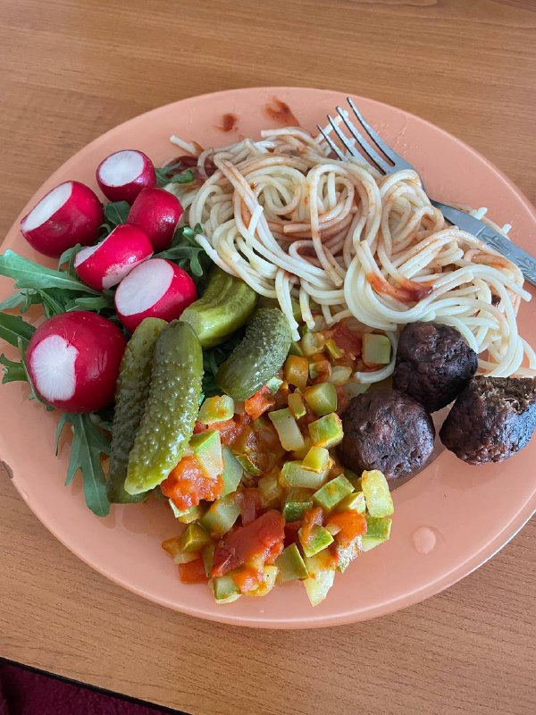Spaghetti With Tomato Sauce, Meatballs, Mixed Salad, Pickles, And Vegetable Sauté
