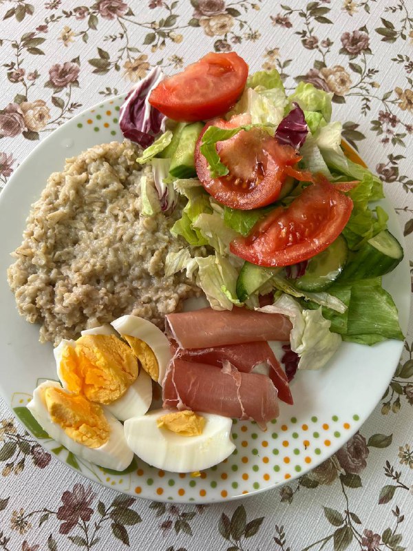 Mixed Plate With Oatmeal, Salad, Eggs, And Prosciutto