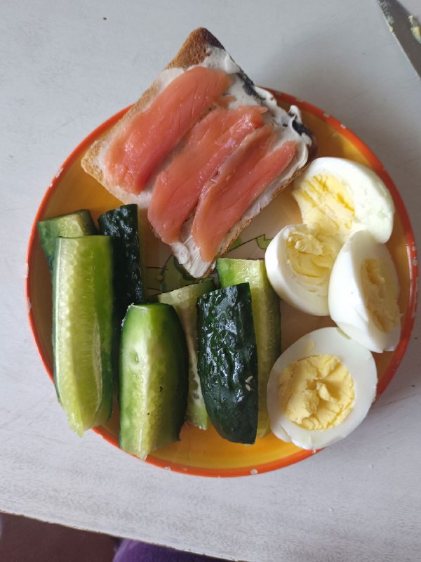Smoked Salmon And Cream Cheese Toast With Cucumber Slices And Boiled Eggs