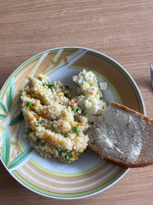 Bulgur With Vegetables And A Side Of Bread With Butter