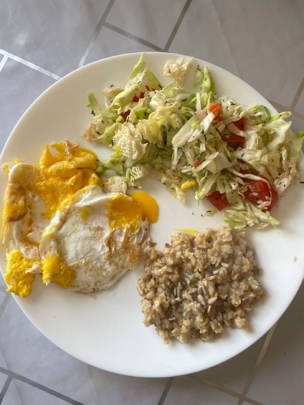 Fried Eggs With Oatmeal And Side Salad