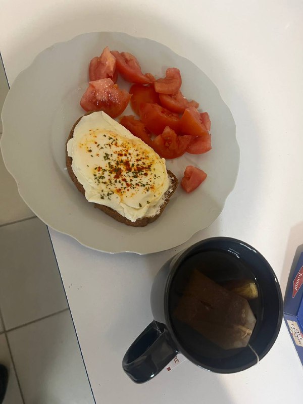 Fried Egg On Toast With Tomato