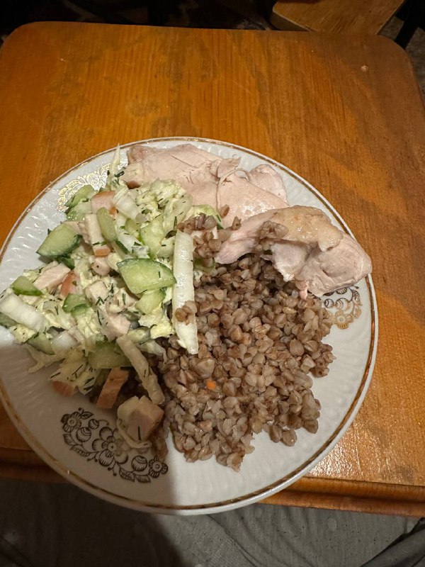 Homemade Meal With Buckwheat, Chicken Thigh, And Cabbage Salad