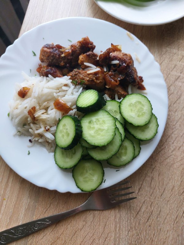 Simple Mixed Dish With Fried Chicken, White Rice, And Cucumbers