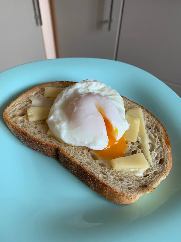 Poached Egg On Toast With Cheese