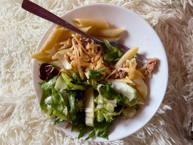 Tuna Pasta Salad With Shredded Cheese And Leafy Greens