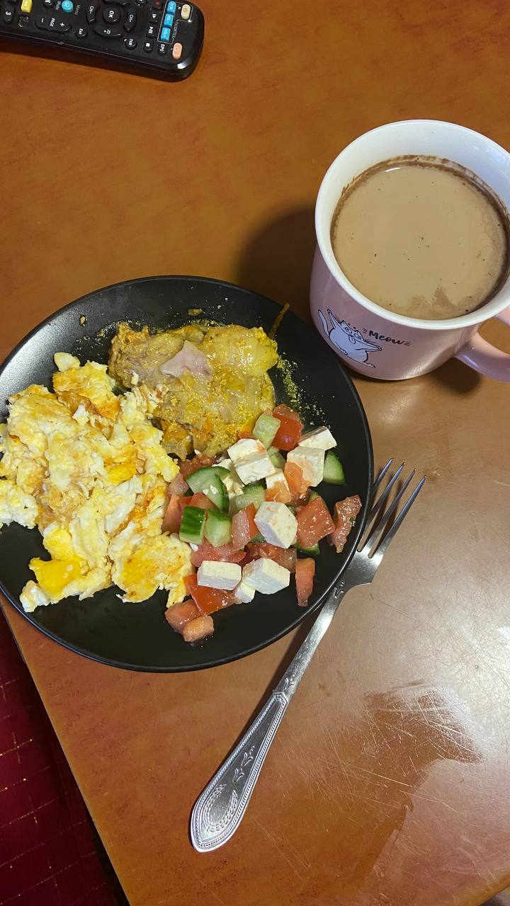 Scrambled Eggs With Greek Salad And Coffee