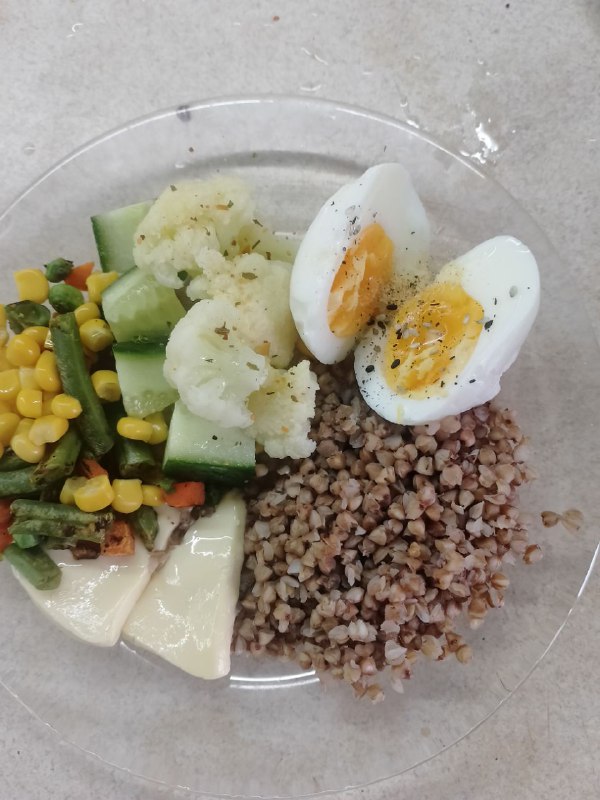 Healthy Meal With Hard-boiled Egg, Mixed Vegetables, And Buckwheat