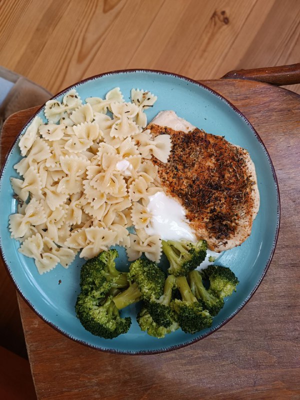 Seasoned Chicken Breast With Bow Tie Pasta And White Sauce