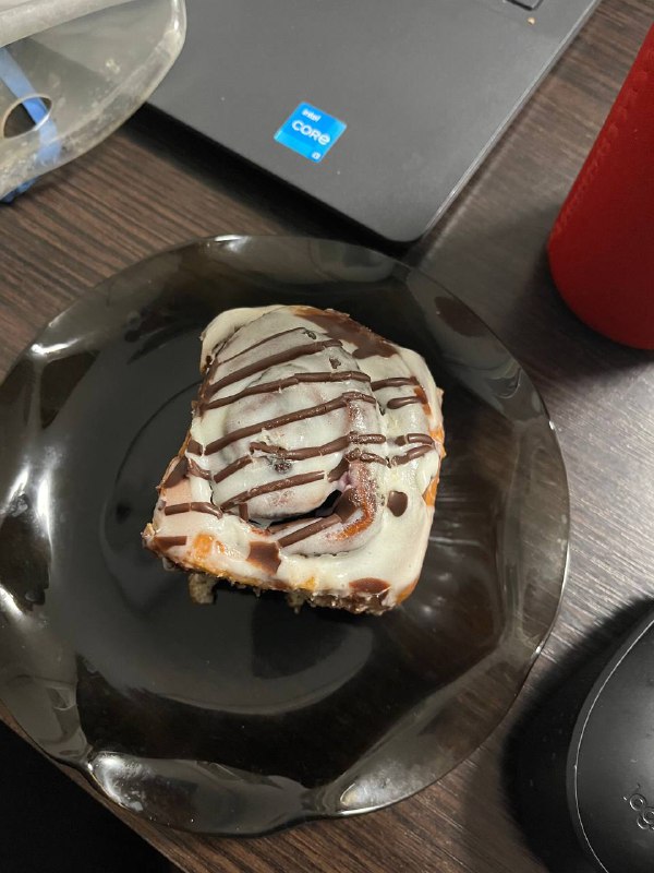 Cheesecake Or Cake Slice With Frosting And Chocolate Drizzle