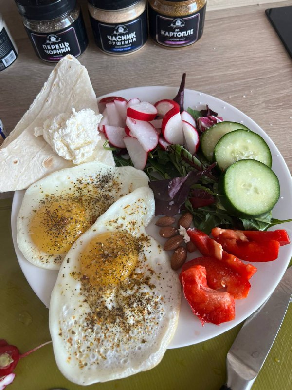 Fried Eggs With Mixed Salad And Cheese