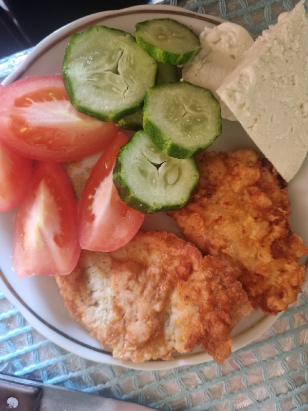 Breaded Chicken Cutlets With Fresh Vegetables And Feta Cheese