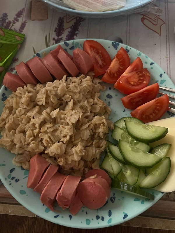 Oatmeal With Hot Dogs, Tomatoes, And Cucumber
