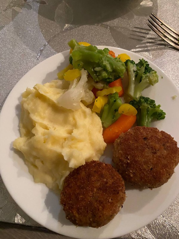Breaded Meat Patties, Mashed Potatoes, And Mixed Vegetables