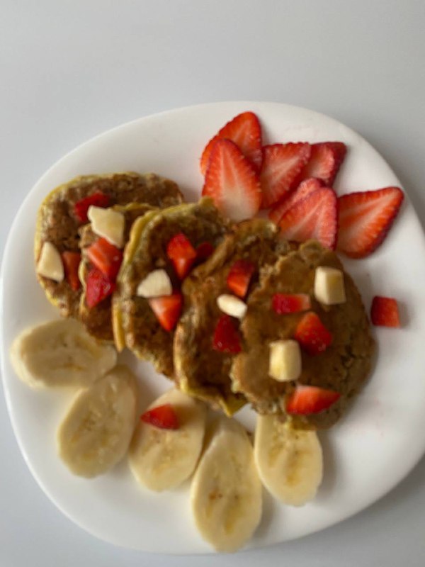Pancakes With Strawberries, Bananas, And Nut Butter