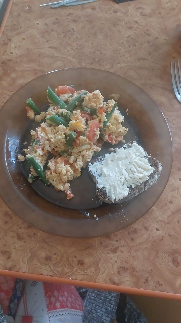 Scrambled Eggs With Vegetables And Bread