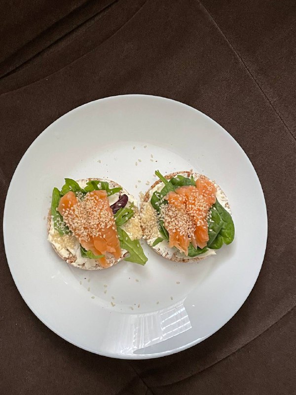 Smoked Salmon and Cream Cheese Bagel with Mixed Greens and Sesame Seeds