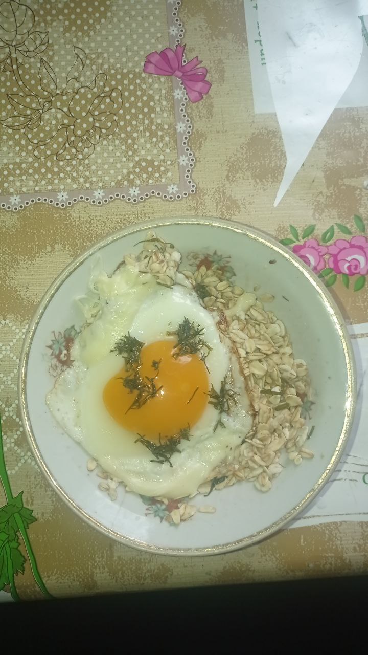 Fried Egg With Herbs And Sunflower Seeds