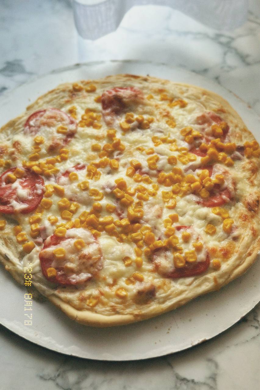 Pizza With Corn And Tomato
