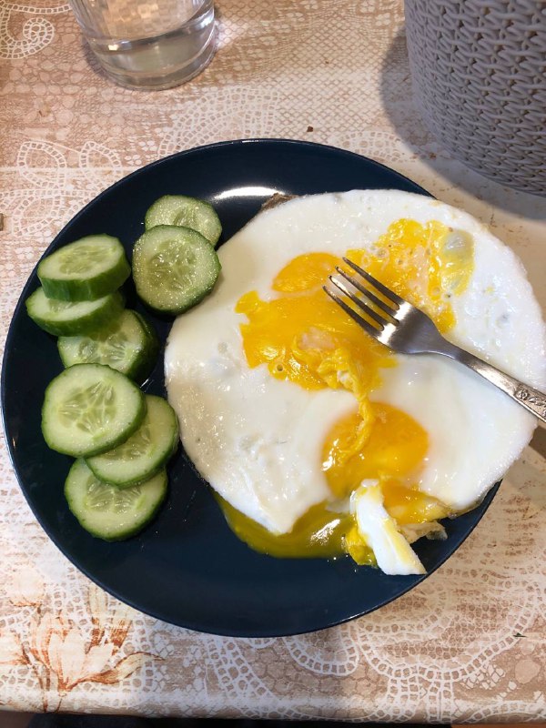 Fried Eggs With Sliced Cucumber