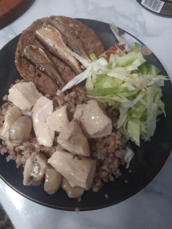 Grilled Chicken With Buckwheat, Salad, And Fish On Bread