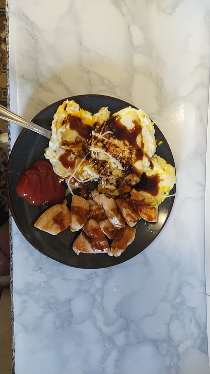 Scrambled Eggs With Sausages And Condiments
