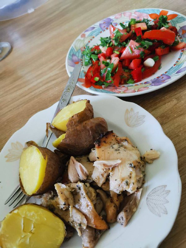 Grilled Chicken With Baked Potatoes And Fresh Vegetable Salad
