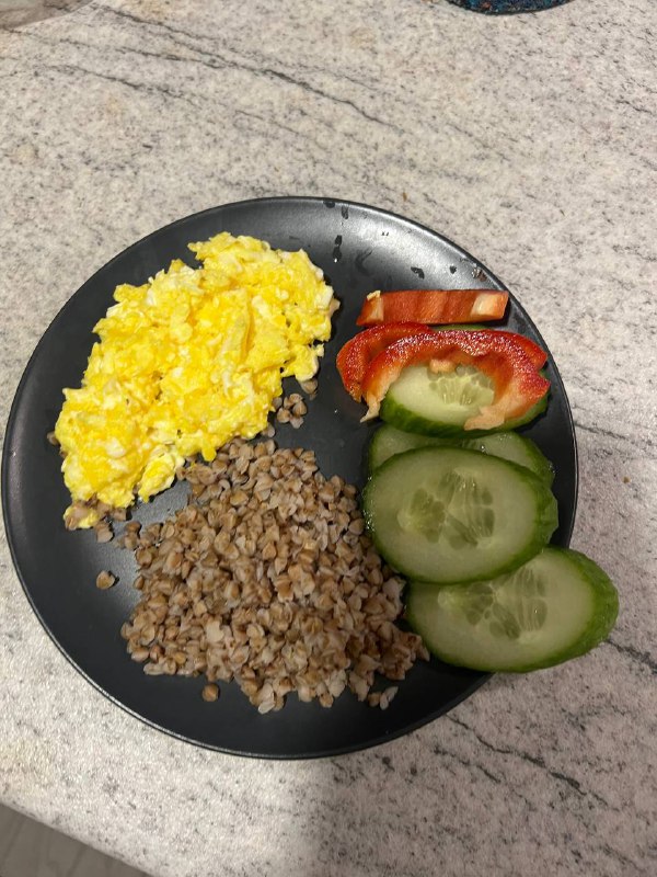 Scrambled Eggs With Buckwheat, Cucumber, And Bell Pepper Slices