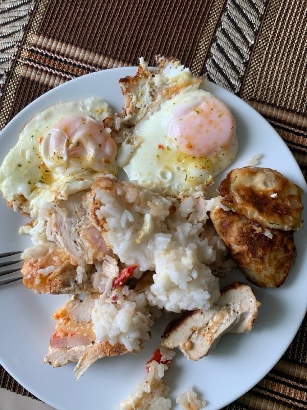 Fried Eggs, Cooked Rice, And Grilled Chicken
