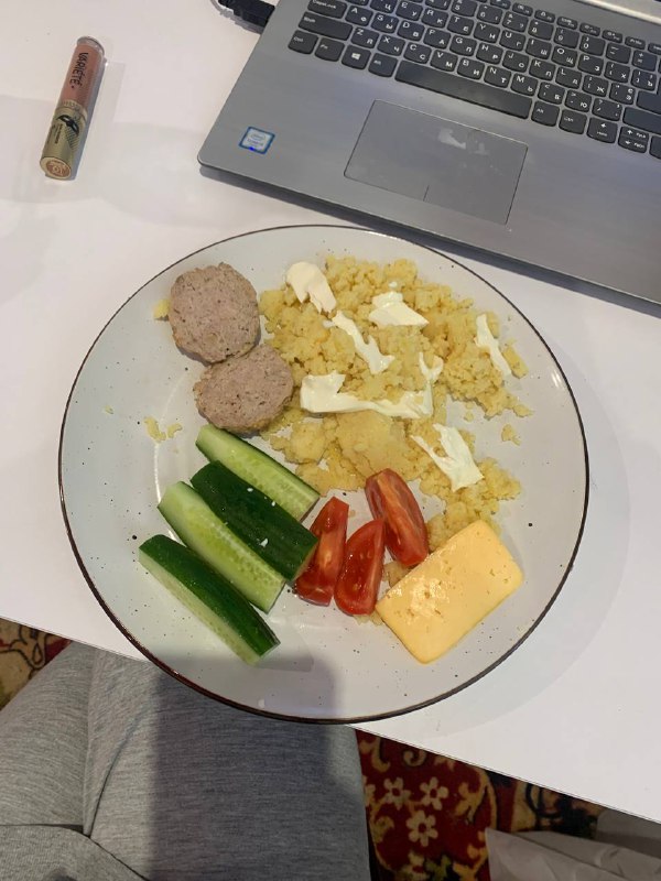 Scrambled Eggs With Sausage, Cheese, Cucumber, And Tomato