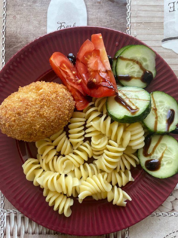 Breaded Chicken Cutlet With Rotini Pasta And Fresh Tomato Cucumber Salad