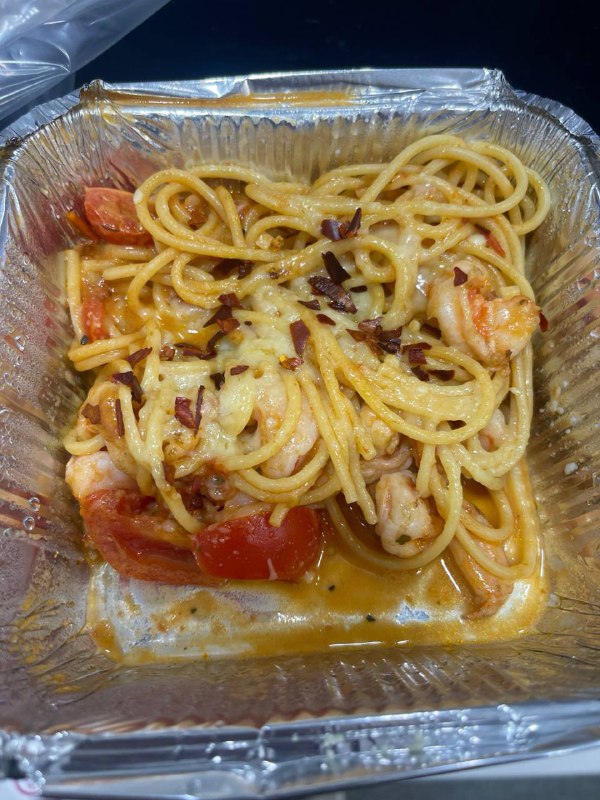 Shrimp Pasta With Cherry Tomatoes In Cream And Tomato Sauce