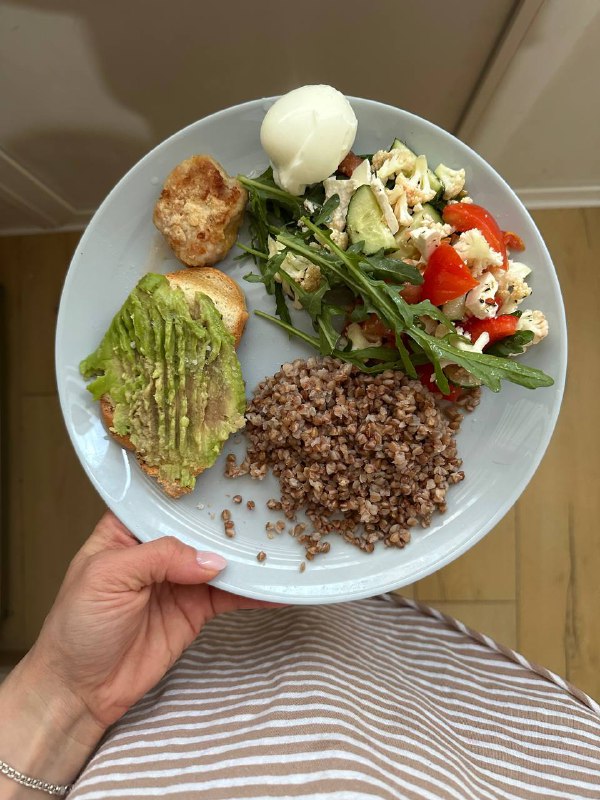 Healthy Balanced Plate With Avocado Toast, Buckwheat, Salad, And Poached Egg