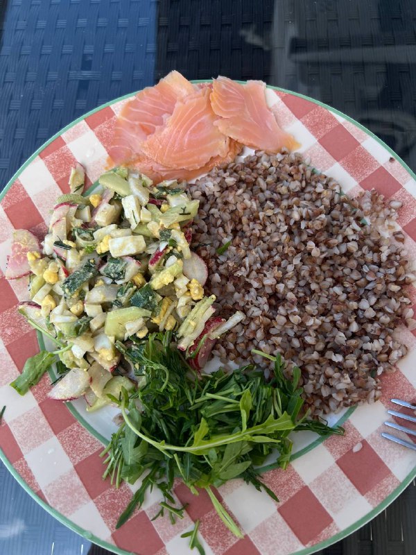 Salmon With Buckwheat, Cucumber Salad With Egg, Radish, And Onion, And Arugula