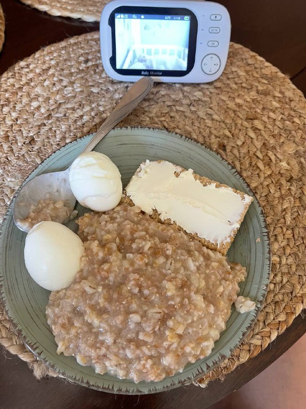 Oatmeal With Boiled Eggs And A Cracker With Cream Cheese
