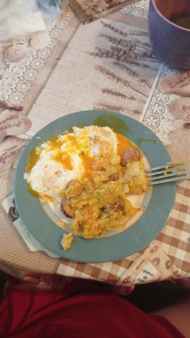 Mashed Potatoes With Sausages And Fried Eggs