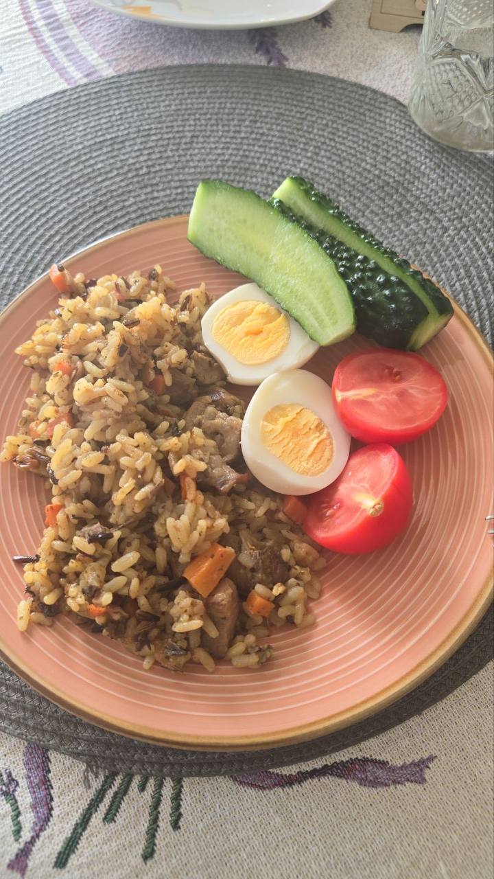 Vegetable Pilaf With Boiled Eggs, Tomatoes, And Cucumber